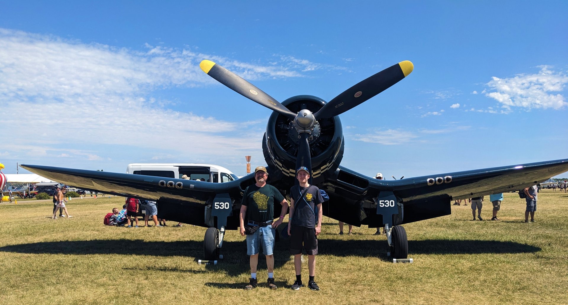 Andrew & Dad Cosair full-wing EAA 2023 (2).jpg